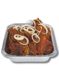 Aluminum tray with cooked meat and onions on a white background