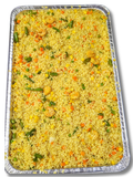 Fried rice dish with vegetables and shrimp in a foil tray on a white background