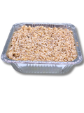ofada rice in an aluminum foil on white background