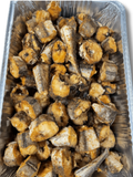 fish in a aluminum foil on a white background