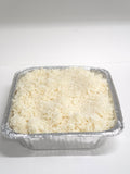 silver tray of white rice on a white background